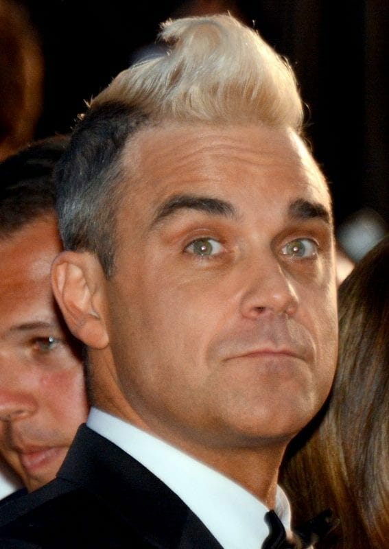 Robbie Williams en Cannes en el 2015. Fuente: Wikipedia. Autor: Georges Biard