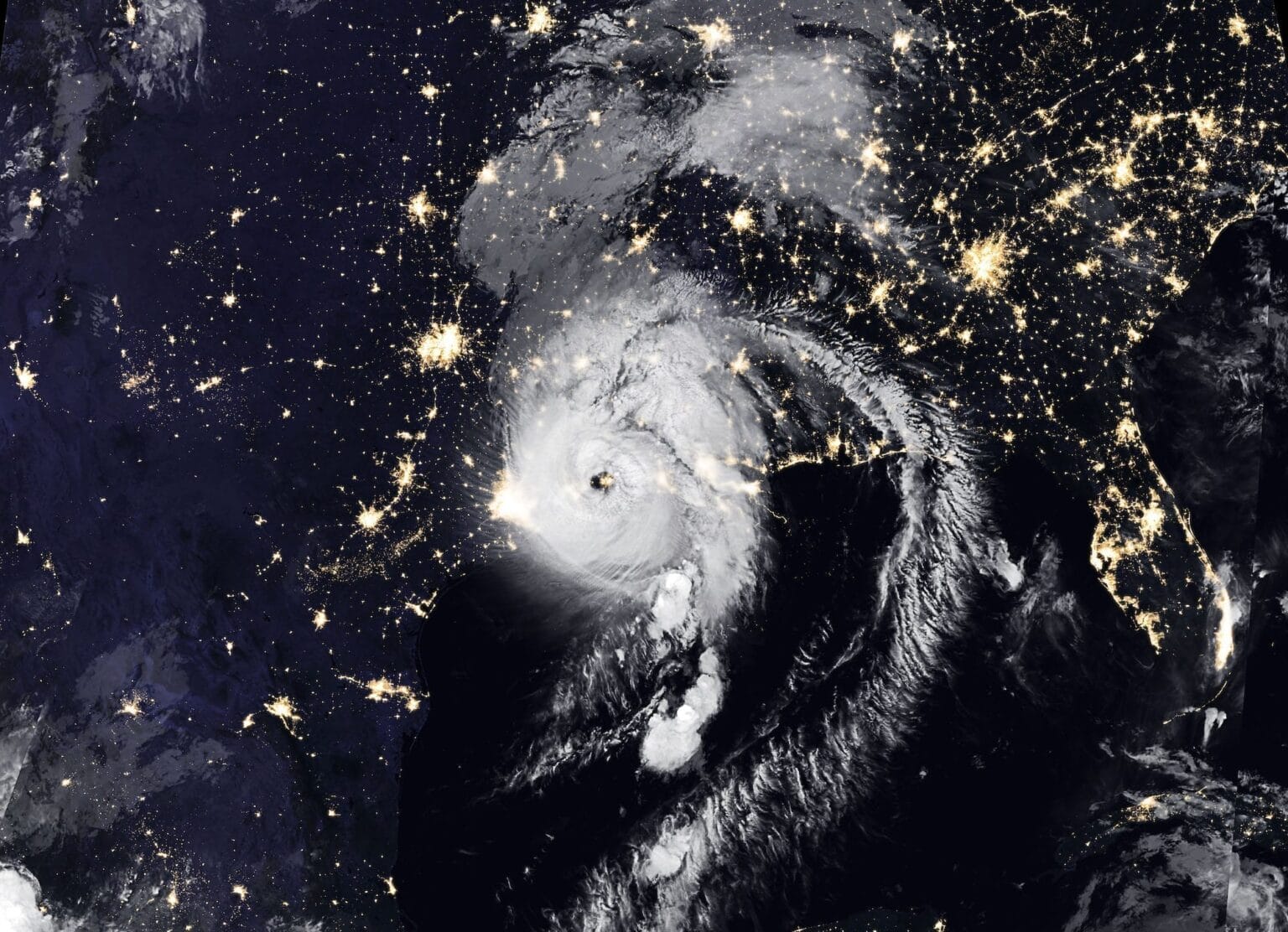 After making landfall near Cameron, Louisiana, as a category 4 storm, Hurricane Laura continued to move northward over western Louisiana. The Visible Infrared Imaging Radiometer Suite (VIIRS) on NOAA-20 acquired this image of Hurricane Laura at 2:50 a.m. Central Daylight Time on August 27, 2020, about two hours after the storm made landfall. Clouds are shown in infrared using brightness temperature data, which is useful for distinguishing cooler cloud structures from the warmer surface below. That data is overlaid on composite imagery of city lights from NASA’s Black Marble dataset. Credits: NASA's Earth Observatory