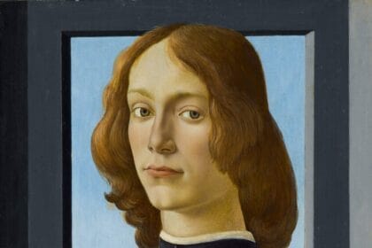 Sandro Botticelli Young Man Holding a Roundel scaled 2