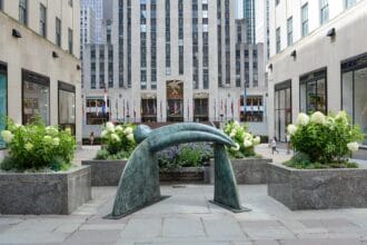 Inside Job, 2019. Bronze, 63 x 104 3/8 x 85 1/16 inches (160 x 265 x 216 cm). In Frieze Sculpture. Installation view, 2020. Rockefeller Center, New York. Photo: Casey Kelbaugh