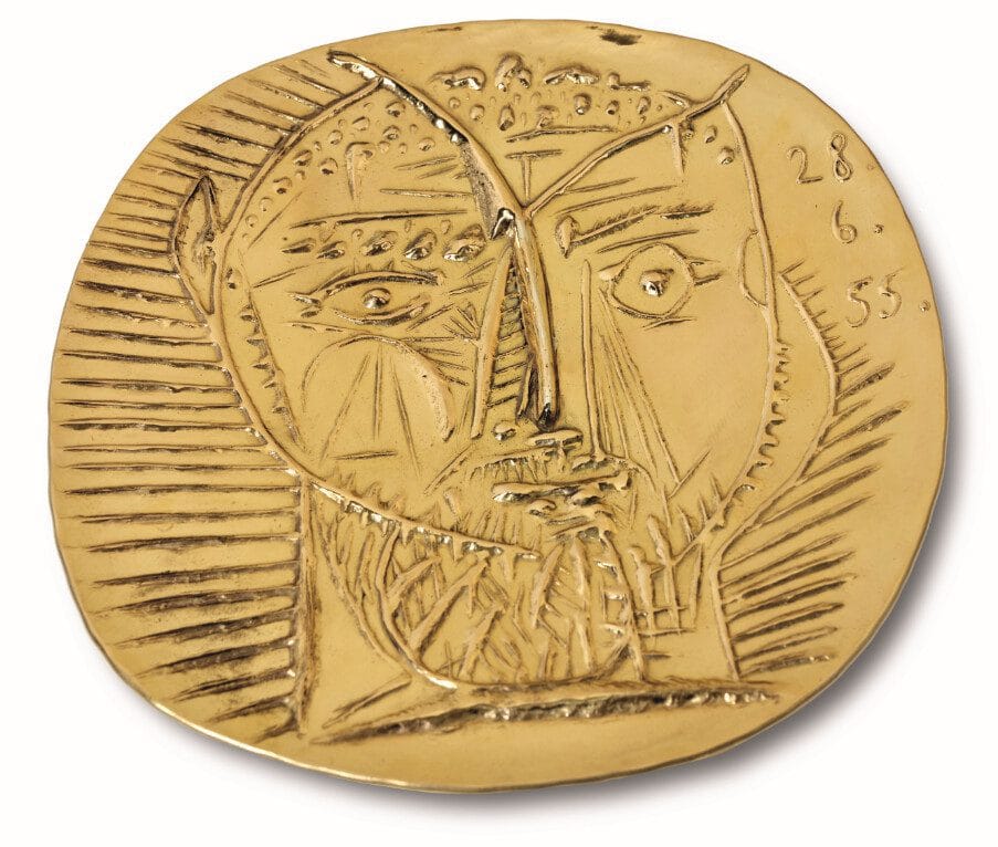Pablo Picasso (1881-1973), Visage de faune, dated '28.6.55.' (upper right), 22-carat gold repoussé plate with wooden presentation box, 25cm (9 3/4in). diameter. Conceived in 1955; this unique example in gold executed in 1968 by François and Pierre Hugo. Estimate: £250,000-350,000.