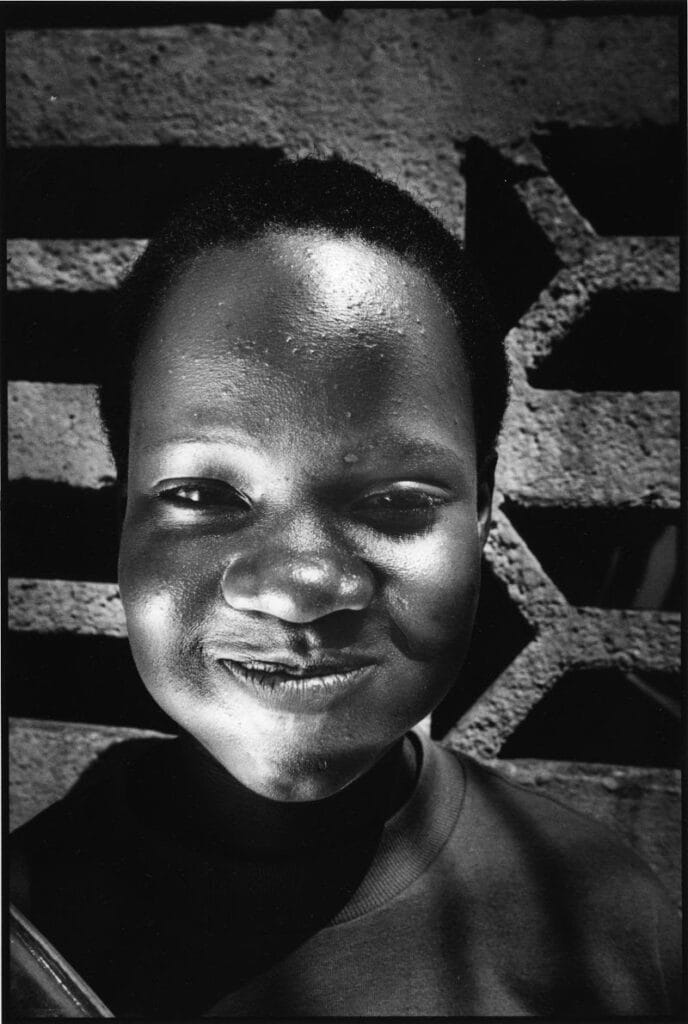 JR (French, born 1983). Women Are Heroes, Liberia, Rebecca Deman, 2009. Gelatin silver photograph. © JR-ART.NET