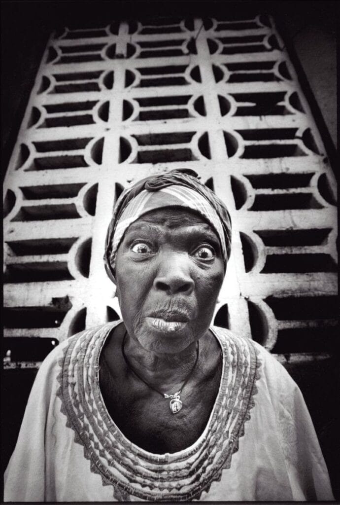 JR (French, born 1983). Women Are Heroes, Liberia, Jessie Jon, 2009. Gelatin silver photograph. © JR-ART.NET