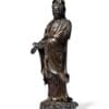 A Rare and Large Silver-Inlaid Bronze Figure of Guanyin, 16th/17th Century Estimate: HK$3,500,000-4,500,000 Sold for HK$4,377,500