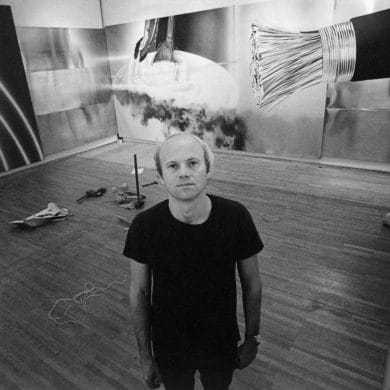 James Rosenquist installing Horse Blinders (1968–69), Wallraf-Richartz-Museum, Cologne, 1972. Photo by Wolf P. Prange. Artwork © 2021 James Rosenquist Foundation / Licensed by Artists Rights Society (ARS), NY. Used by permission. All rights reserved.