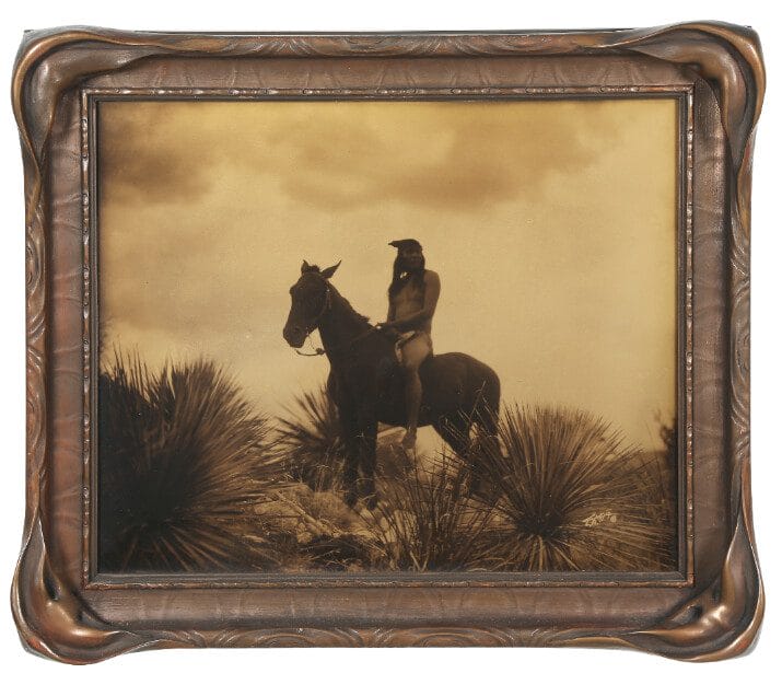 EDWARD S. CURTIS (1868-1952), The Scout Apache, 1905 Price realized: $94,063  (estimate: $7,000-9,000)