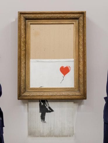 Banksy’s Love is in the Bin, 2018 (Estimate £4-6 million)