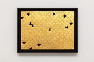 Gabriel Dawe, Missing No. 3, 2019, 24 karat gold on puzzle in artist frame, 13h x 18w in, image courtesy of the artist and Talley Dunn Gallery