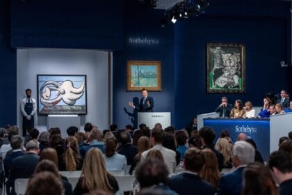Sotheby's Chairman and Auctioneer Oliver Barker fields bids in Sotheby’s Modern Evening Sale