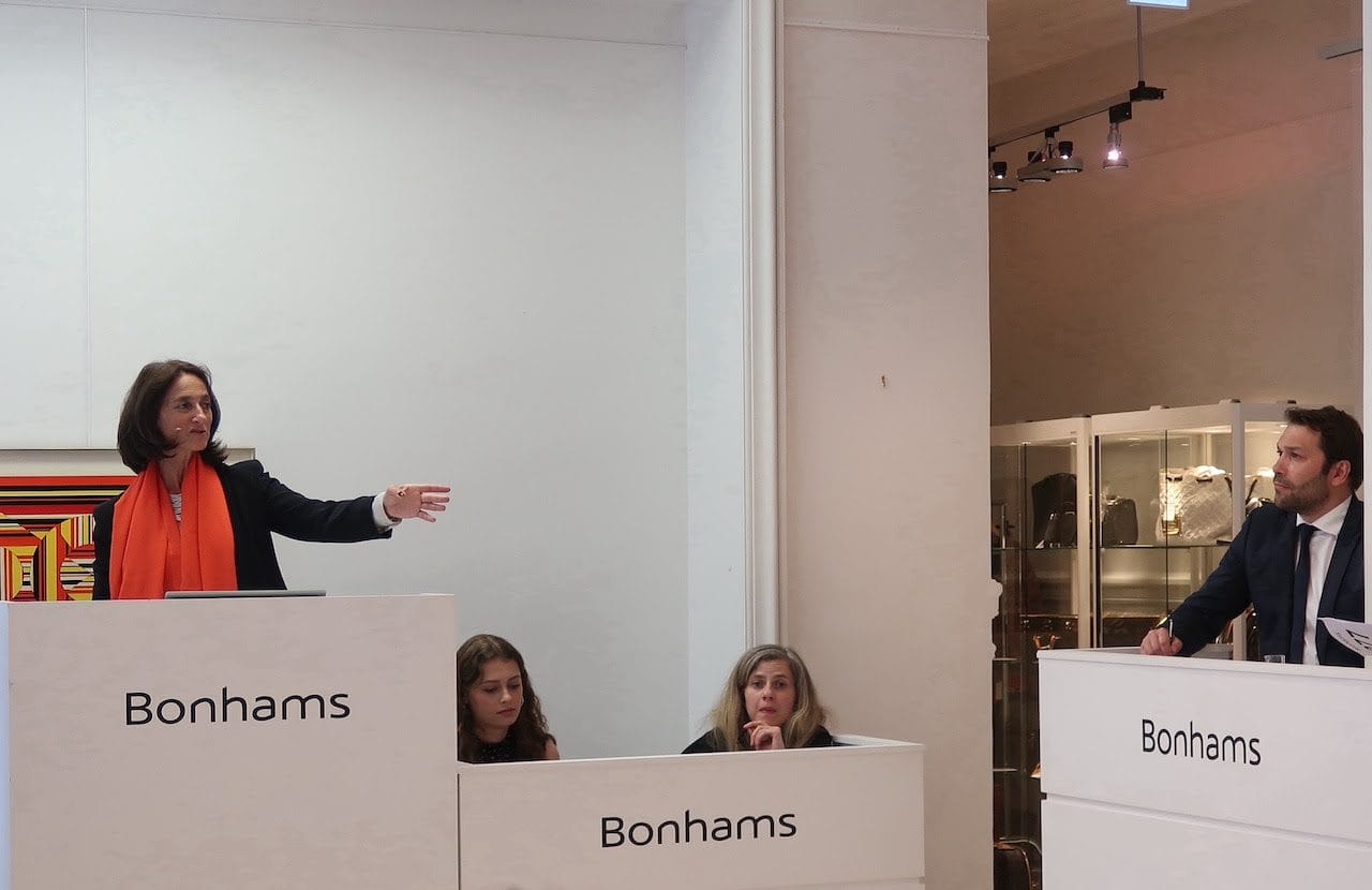 Catherine Yaiche, Managing Director, Bonhams France on the rostrum at the Paris Fine Watches Sale