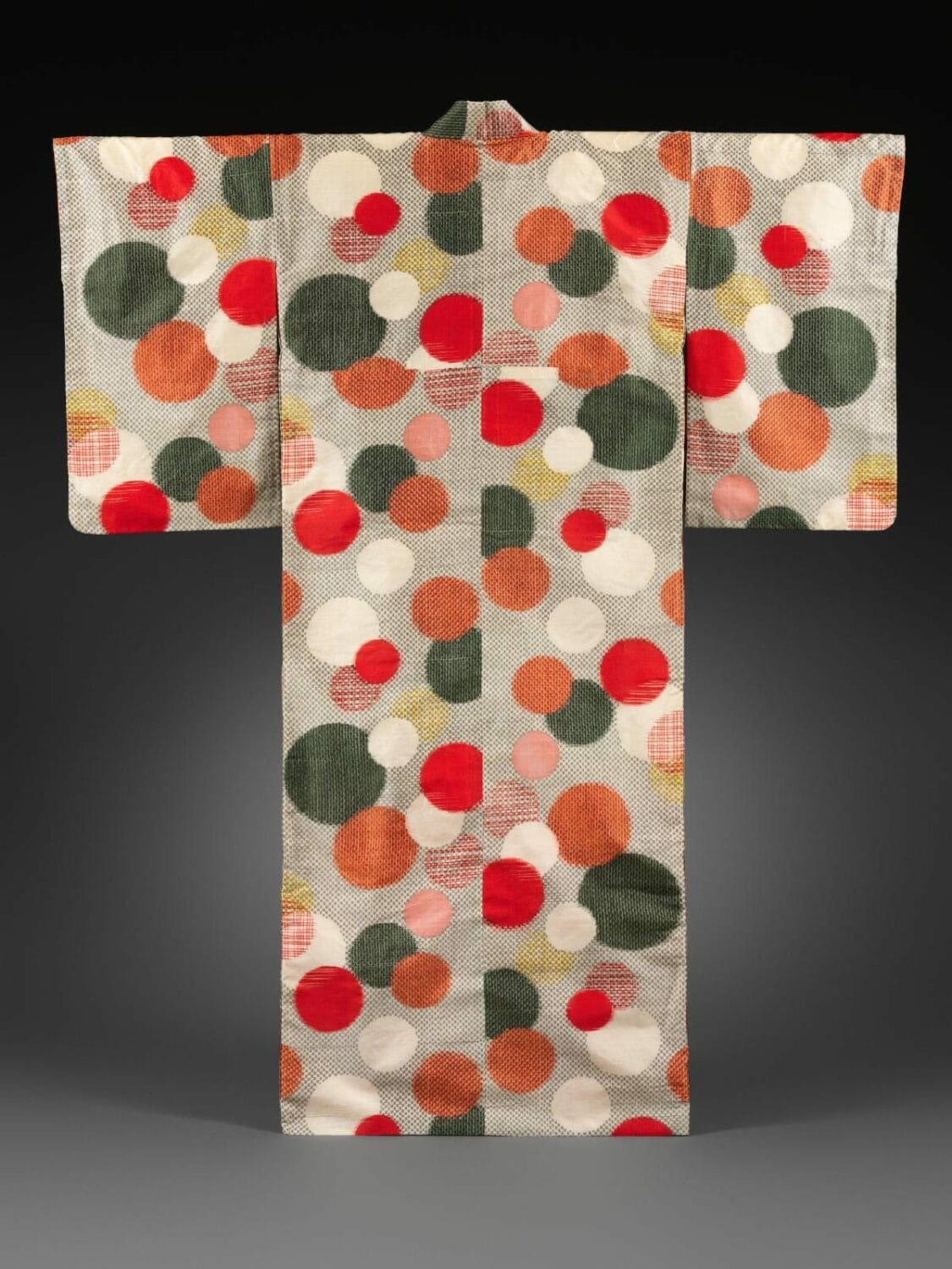Meisen kimono with water droplets. Sh?wa period (1926–89), ca. 1930–40. Plain-weave reeled-silk warps with machine-spun silk wefts in double ikat (heiy?-gasuri). 59 x 49 1/4 in. (149.9 x 125.1 cm). Promised Gift of John C. Weber. Image © The Metropolitan Museum of Art, photo by Paul Lachenauer.
