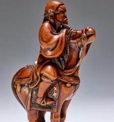 A wood Netsuke of a mounted Chinese horseman by Hoshin, Kyoto, late 18th century sold for €127,400
