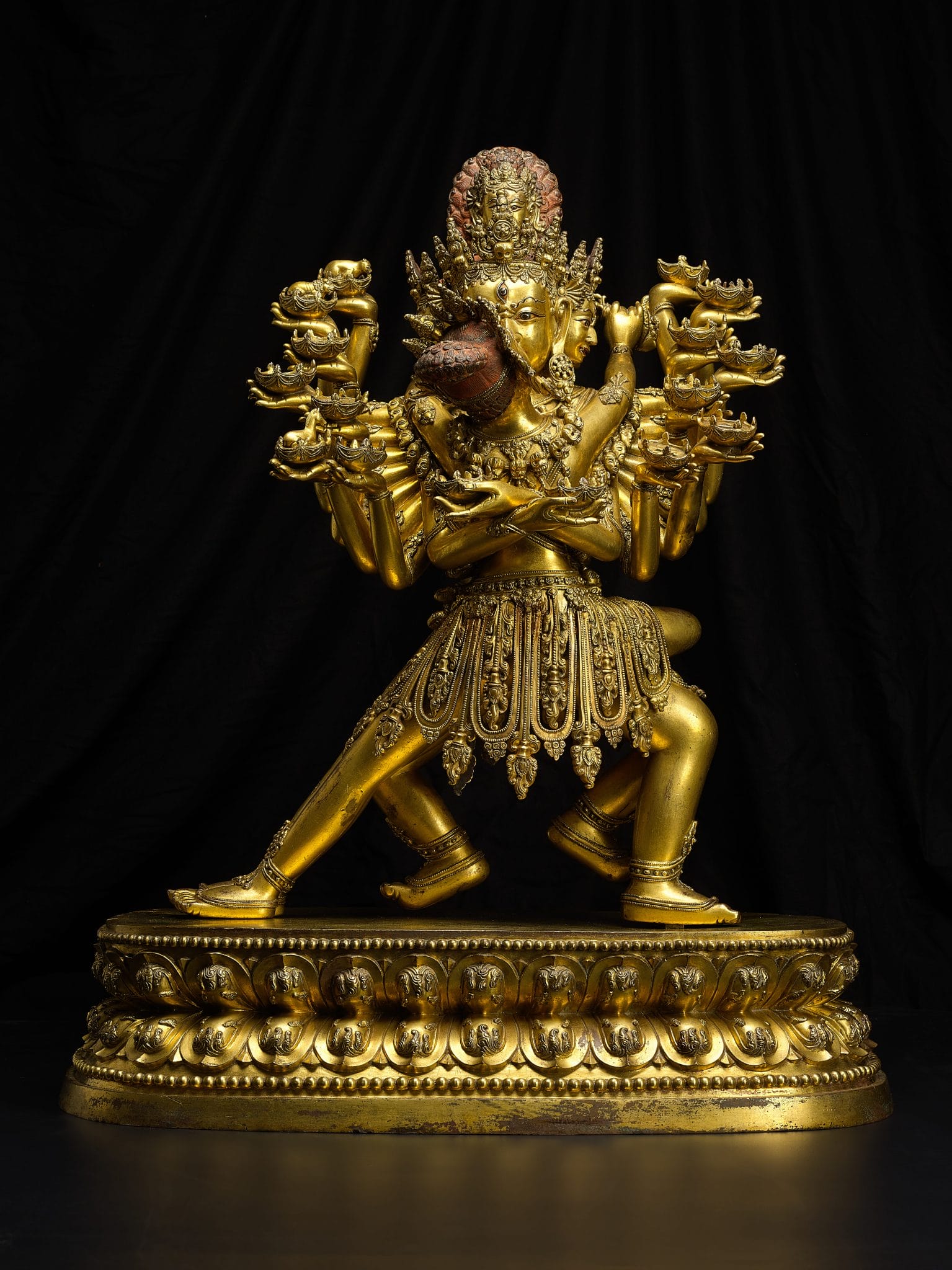 A monumental gilt-bronze figure of Kapaladhara Hevajra, Early Ming Dynasty, Overall Height: 66 cm. (26 in.), Est. $3,000,000- $5,000,000